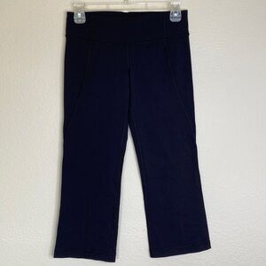 Lululemon black crops split back ruched waist Sz 4 EUC